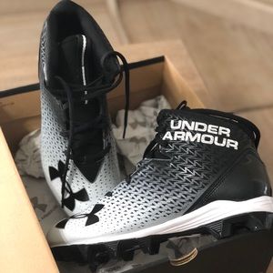 Brand new in box UA football cleats